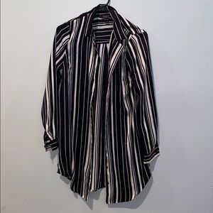 Long button up shirt / dress .